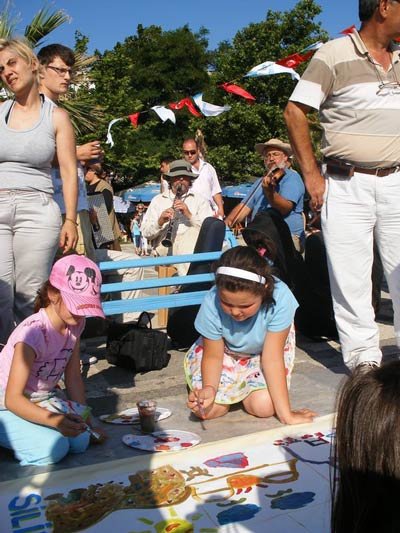 Children Painting murals on the VE